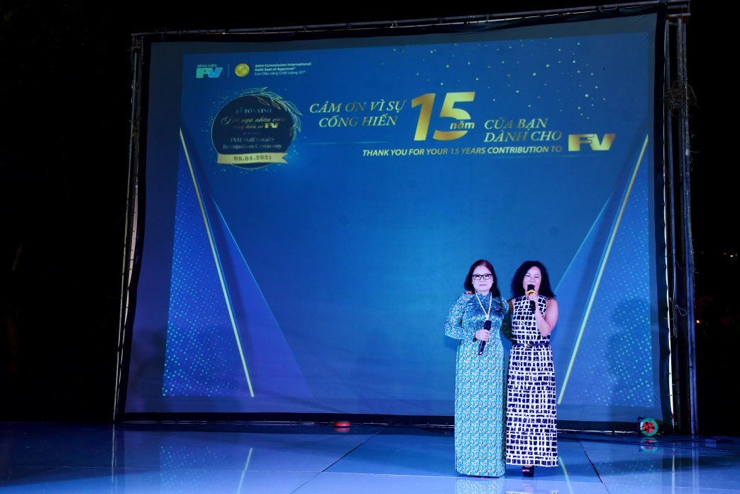 Ms Le Thu - Marketing & Business Development Director and Ms Chau Doai - Sales Department during the honour ceremony