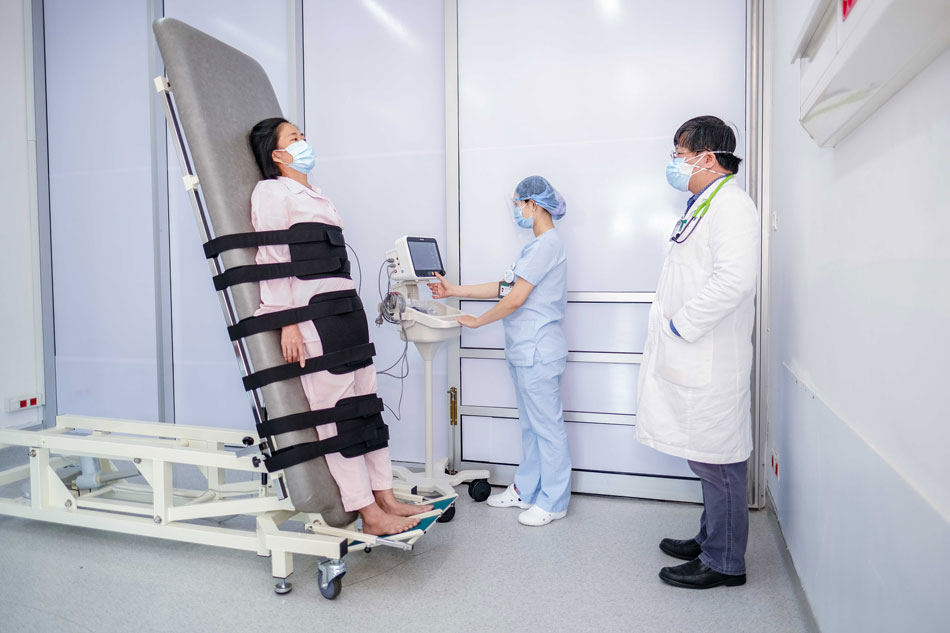 Doctor and Nurse monitor the patient’s condition during the test.