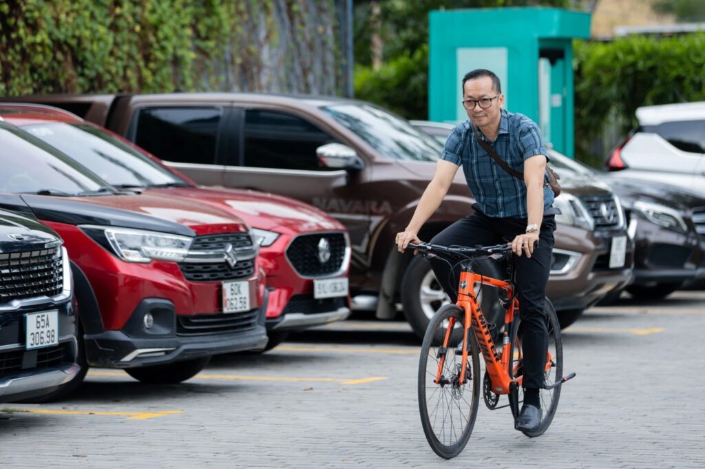 Dr Thinh chooses to go to work by bicycle as a way to exercise with his limited time