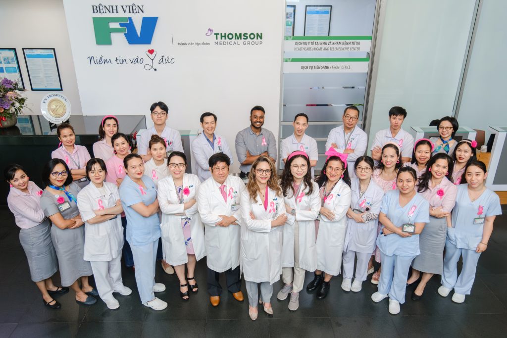 Hy Vong Cancer Care Centre staff dressed in pink and took photos to promote a message of support for patients and the community