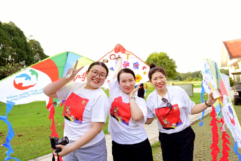 Ms Minh Quý (far right) is committed to supporting underprivileged children through her involvement in the programme.