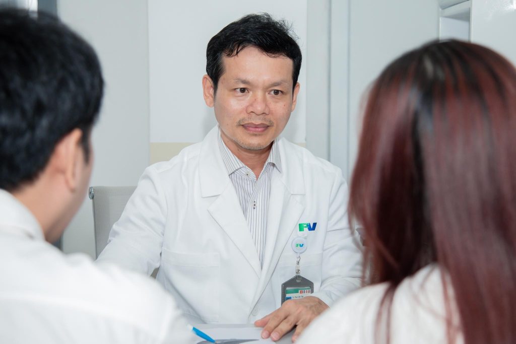 Specialist Level II, Dr Phan Van Thai, MD, MSc, consulted the patient about the risks involved in the second surgery to treat the rectal perforation.