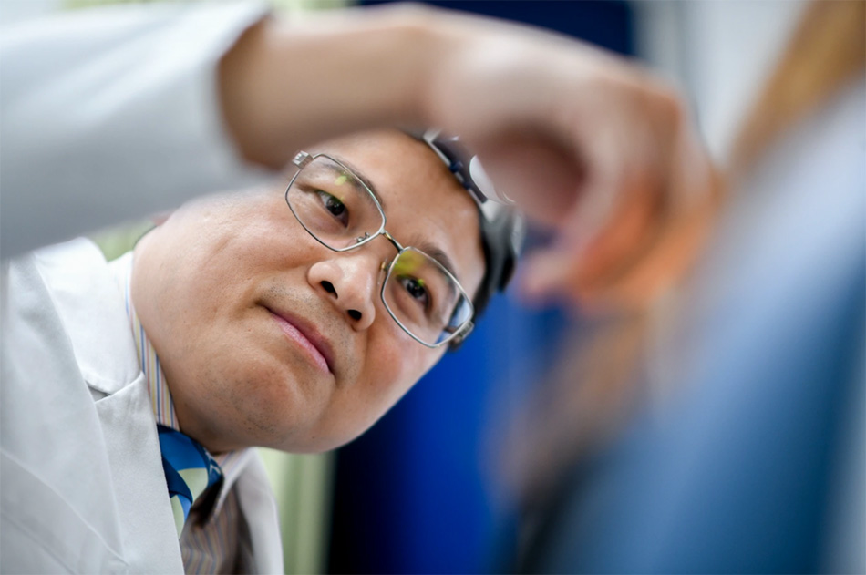 Vo Cong Minh, MD, PhD performs an intratympanic injection to treat sudden hearing loss