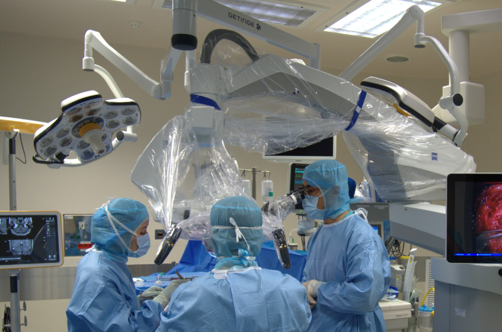 Dr Tran Luong Anh performing brain tumour surgery for the patient. 